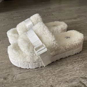 Never worn. Stickers still on